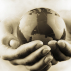 Hands holding globe